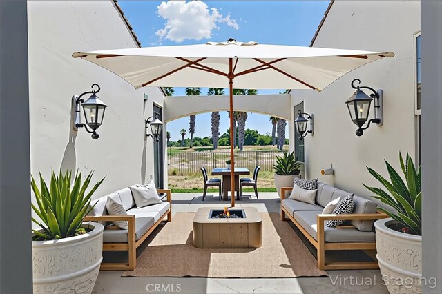 13045 Ridgewood Way, Chowchilla, CA 93610 - view of patio / terrace featuring an outdoor living space with a fire pit