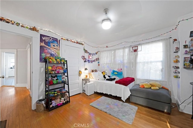 1914 S W View St, Los Angeles, CA 90016 - bedroom with wood-type flooring and a closet