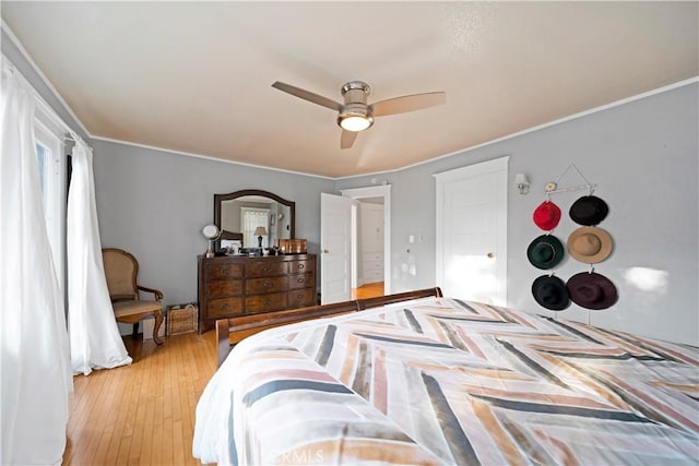 1914 S W View St, Los Angeles, CA 90016 - bedroom featuring ceiling fan, light wood-type flooring, and crown molding