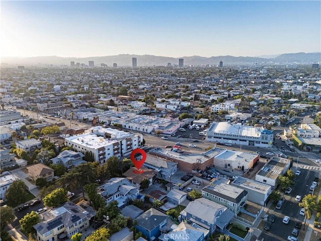 1914 S W View St, Los Angeles, CA 90016 - aerial overview of property's location with a mountain backdrop and nearby urban area