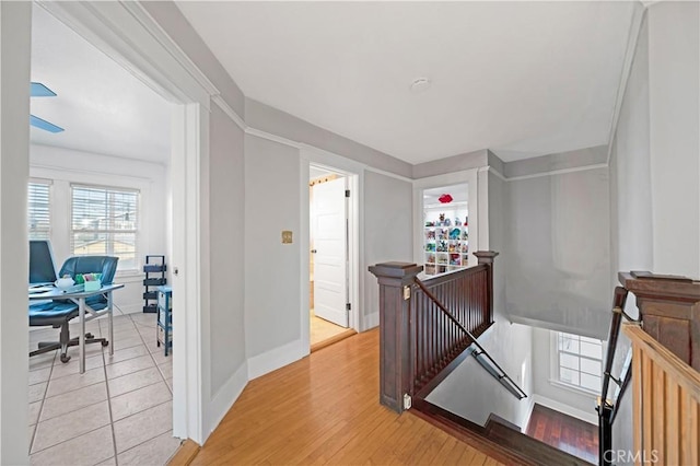 1914 S W View St, Los Angeles, CA 90016 - corridor featuring an upstairs landing, baseboards, and light wood-style floors