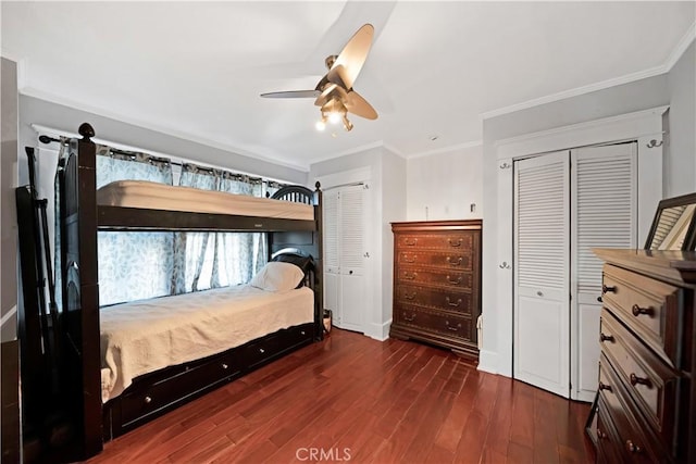 1914 S W View St, Los Angeles, CA 90016 - bedroom featuring multiple closets, dark wood finished floors, ornamental molding, ceiling fan, and baseboards