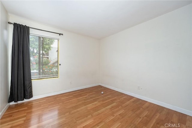 3505 Angelucci St Unit 2E, San Diego, CA 92111 - spare room with light wood-style flooring and baseboards