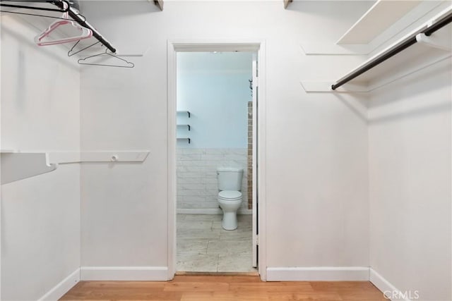 3505 Angelucci St Unit 2E, San Diego, CA 92111 - spacious closet with light wood finished floors