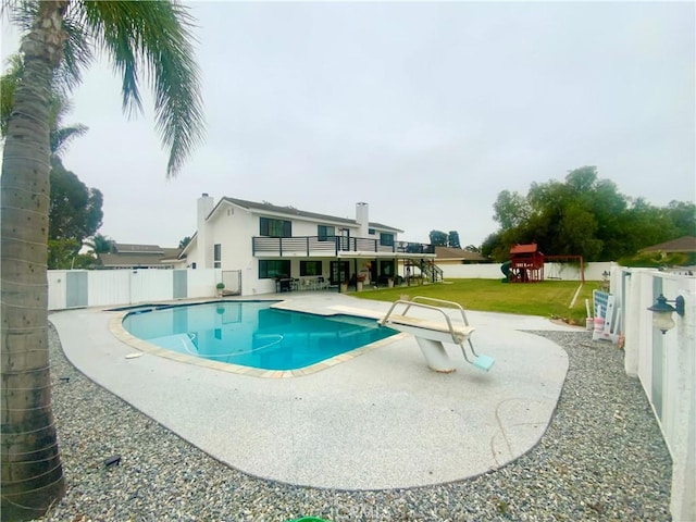 2416 Hialeah Cir, Norco, CA 92860 - view of swimming pool featuring a playground, a patio, and a diving board