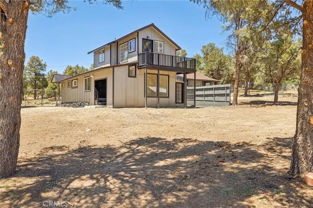 1850 Pond, Big Bear City, CA 92314 - back of property featuring a balcony and board and batten siding