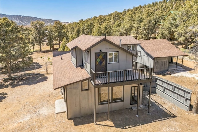 1850 Pond, Big Bear City, CA 92314 - back of house featuring a deck and roof with shingles