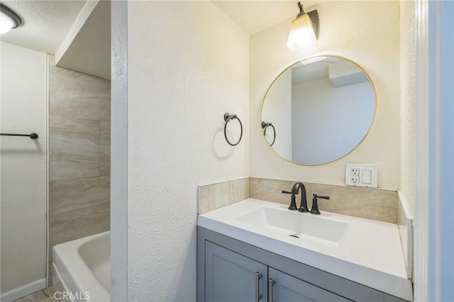 1850 Pond, Big Bear City, CA 92314 - full bath with vanity, a bathtub, and a textured wall