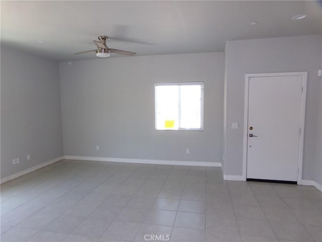 12612 Maui Way, Desert Hot Springs, CA 92240 - empty room featuring a ceiling fan, baseboards, and light tile patterned flooring