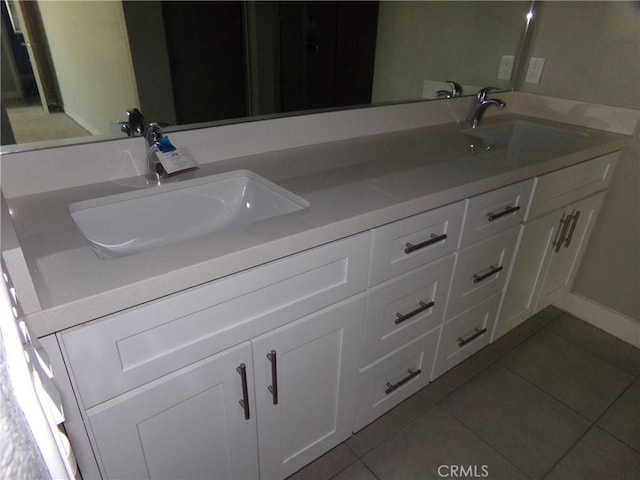 12612 Maui Way, Desert Hot Springs, CA 92240 - bathroom featuring tile patterned floors and double vanity