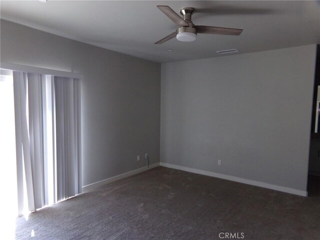 12612 Maui Way, Desert Hot Springs, CA 92240 - carpeted empty room featuring ceiling fan and baseboards