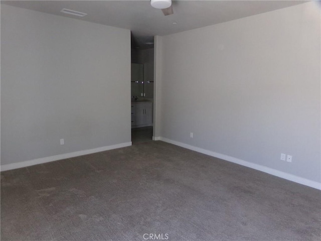 12612 Maui Way, Desert Hot Springs, CA 92240 - empty room featuring carpet floors and baseboards