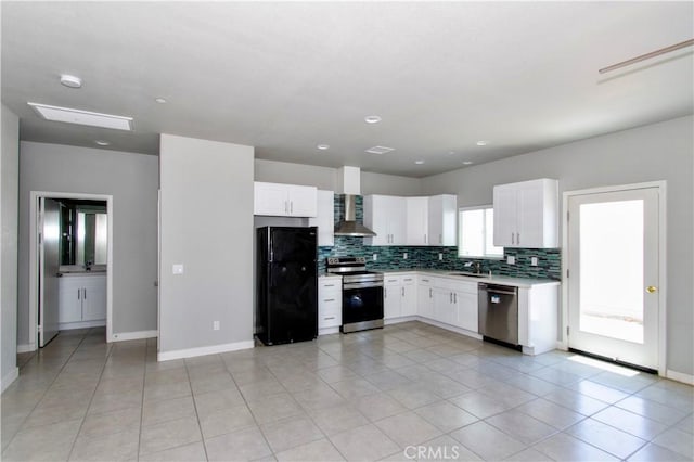 12612 Maui Way, Desert Hot Springs, CA 92240 - kitchen with appliances with stainless steel finishes, wall chimney exhaust hood, decorative backsplash, white cabinetry, and recessed lighting