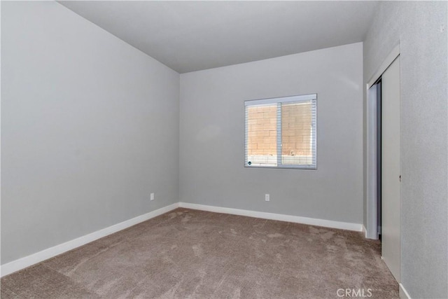 12612 Maui Way, Desert Hot Springs, CA 92240 - spare room with carpet and baseboards