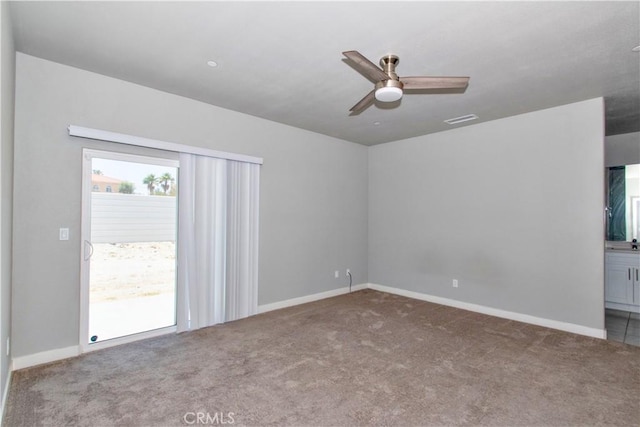 12612 Maui Way, Desert Hot Springs, CA 92240 - carpeted empty room with ceiling fan and baseboards