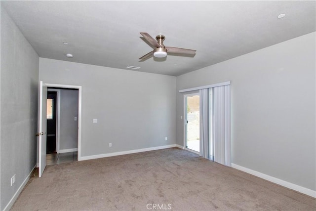12612 Maui Way, Desert Hot Springs, CA 92240 - unfurnished room featuring a ceiling fan, light carpet, and baseboards