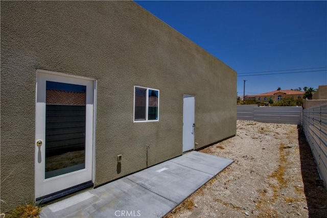 12612 Maui Way, Desert Hot Springs, CA 92240 - view of side of home with stucco siding