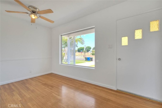 11206 Quinn St, Downey, CA 90241 - empty room with light wood-type flooring, ceiling fan, and baseboards