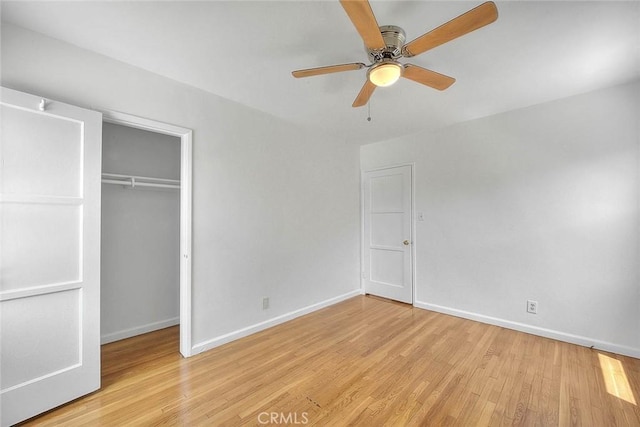11206 Quinn St, Downey, CA 90241 - unfurnished bedroom featuring light wood-style flooring, a closet, baseboards, and ceiling fan