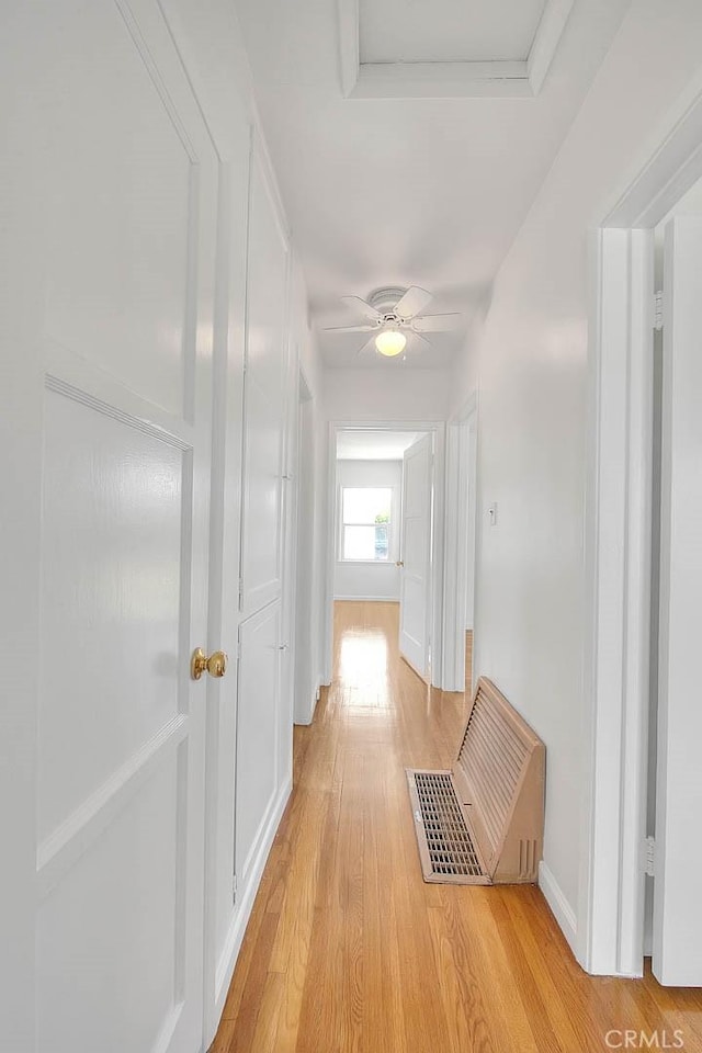 11206 Quinn St, Downey, CA 90241 - hall featuring light wood-style flooring and baseboards