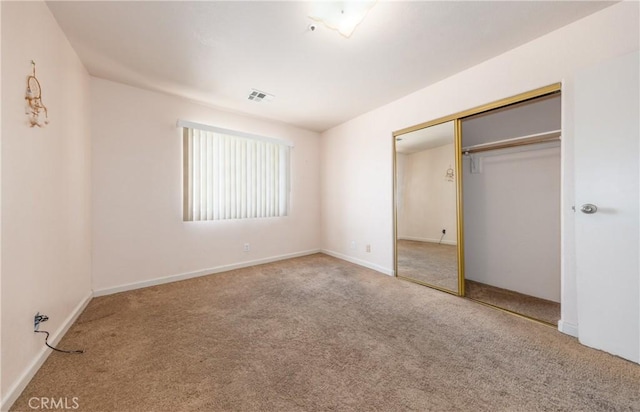 66427 3rd St, Desert Hot Springs, CA 92240 - unfurnished bedroom with carpet floors, a closet, and baseboards