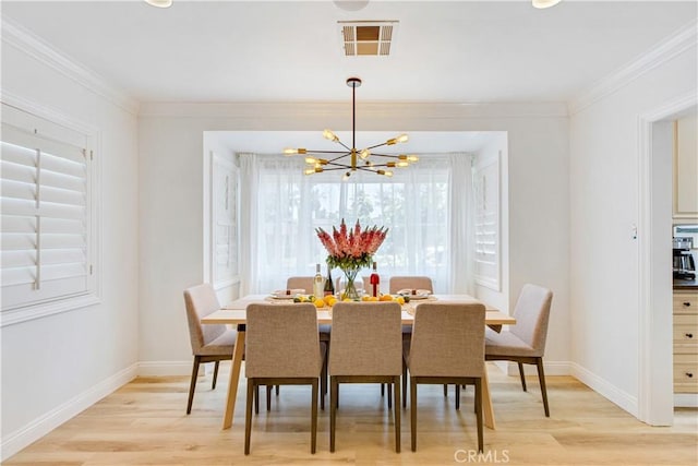4901 Ethel Ave, Sherman Oaks, CA 91423 - dining space featuring a chandelier, light wood-style flooring, baseboards, and crown molding