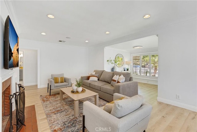 4901 Ethel Ave, Sherman Oaks, CA 91423 - living room with ornamental molding, light wood-style floors, a fireplace, recessed lighting, and baseboards