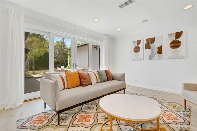 4901 Ethel Ave, Sherman Oaks, CA 91423 - living area with ornamental molding, light wood-type flooring, recessed lighting, and baseboards