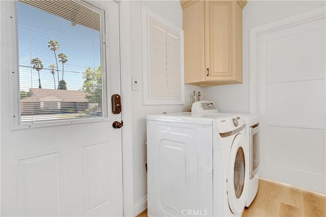 4901 Ethel Ave, Sherman Oaks, CA 91423 - laundry area with cabinet space, washer and clothes dryer, and light wood-style floors