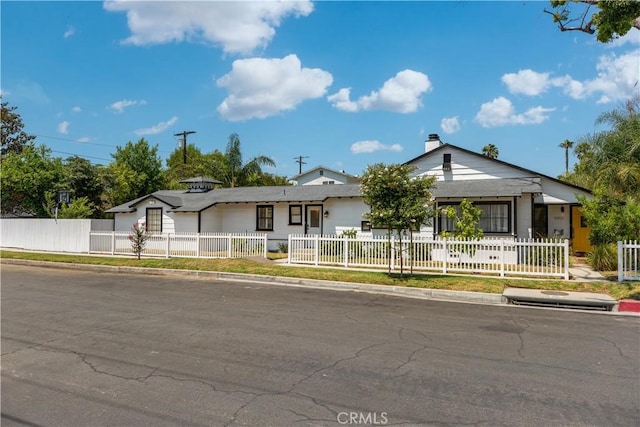 4901 Ethel Ave, Sherman Oaks, CA 91423 - ranch-style house featuring a fenced front yard and a chimney