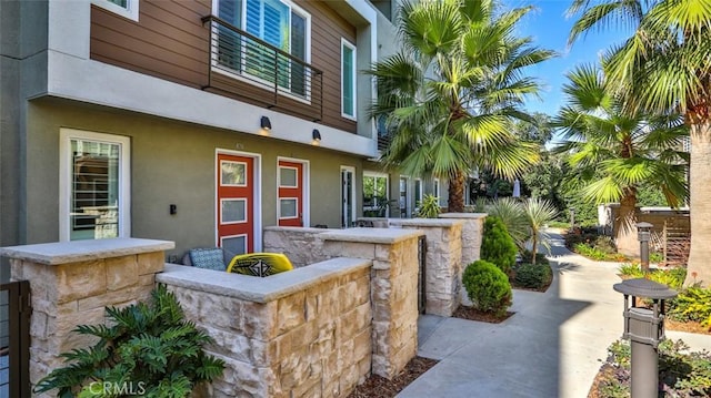 876 Doheny Way, Dana Point, CA 92629 - doorway to property with stucco siding