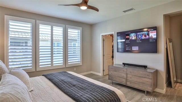 876 Doheny Way, Dana Point, CA 92629 - bedroom featuring baseboards, light wood-type flooring, and a ceiling fan
