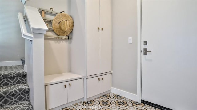 876 Doheny Way, Dana Point, CA 92629 - mudroom with baseboards and light colored carpet
