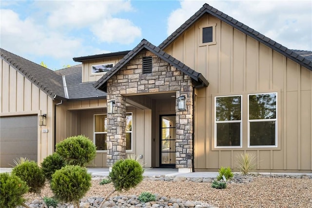4956 Malibu Dr, Paradise, CA 95969 - craftsman inspired home with board and batten siding, an attached garage, and stone siding