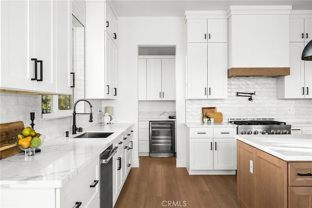 4956 Malibu Dr, Paradise, CA 95969 - kitchen featuring beverage cooler, a sink, premium range hood, wood finished floors, and decorative backsplash