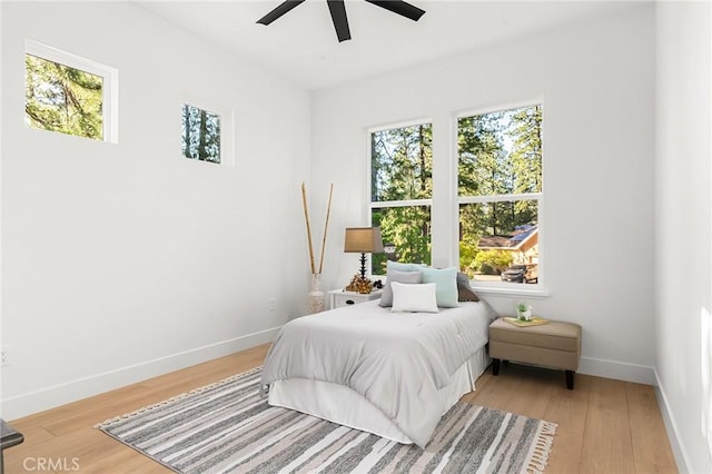 4956 Malibu Dr, Paradise, CA 95969 - bedroom featuring light wood-style floors, baseboards, and a ceiling fan