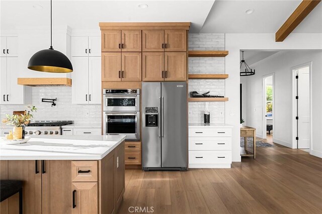 4956 Malibu Dr, Paradise, CA 95969 - kitchen featuring appliances with stainless steel finishes, open shelves, tasteful backsplash, dark wood-style flooring, and pendant lighting