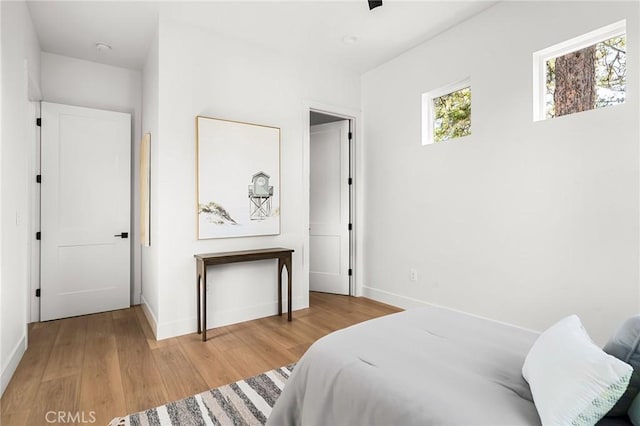 4956 Malibu Dr, Paradise, CA 95969 - bedroom featuring wood finished floors and baseboards