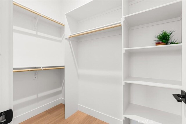 4956 Malibu Dr, Paradise, CA 95969 - spacious closet featuring wood finished floors