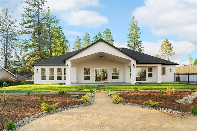 4956 Malibu Dr, Paradise, CA 95969 - back of house with ceiling fan, stucco siding, a patio area, and roof with shingles