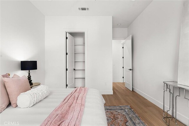 4956 Malibu Dr, Paradise, CA 95969 - bedroom with wood finished floors and baseboards