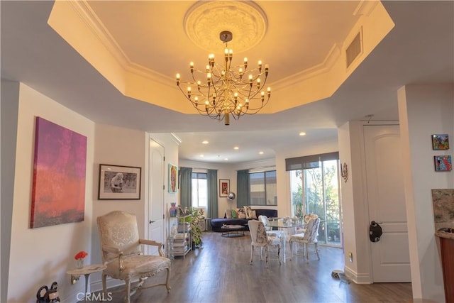 855 Wilcox Ave Unit 401, Los Angeles, CA 90038 - dining space with a tray ceiling, wood finished floors, a chandelier, recessed lighting, and baseboards