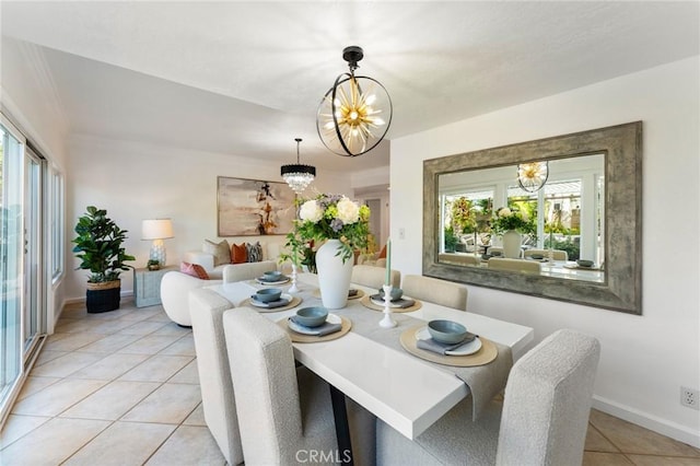 5291 Strasbourg Ave, Irvine, CA 92604 - dining area featuring a chandelier, light tile patterned flooring, plenty of natural light, and baseboards