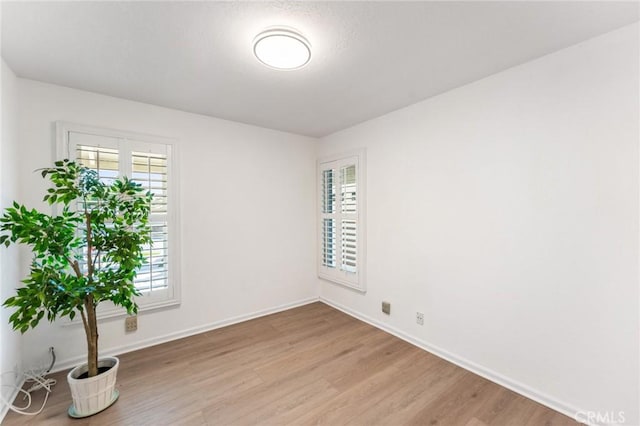 5291 Strasbourg Ave, Irvine, CA 92604 - empty room featuring wood finished floors and baseboards