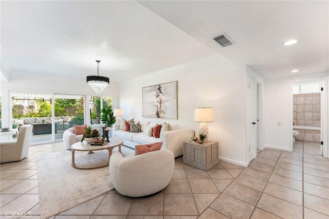 5291 Strasbourg Ave, Irvine, CA 92604 - living area with light tile patterned floors, healthy amount of natural light, recessed lighting, and a chandelier