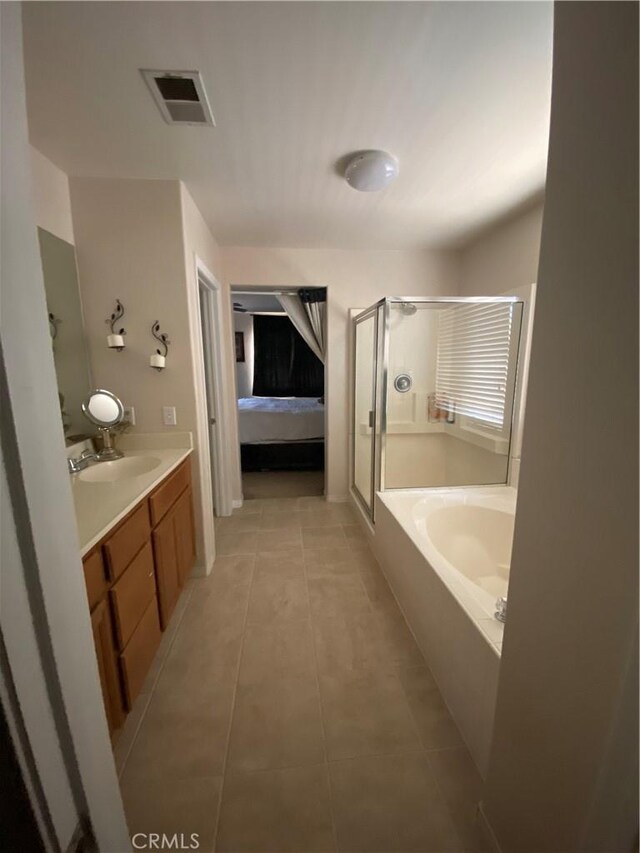 30710 Tierra Linda Ct, Menifee, CA 92584 - full bathroom with a shower stall, vanity, a bath, tile patterned flooring, and ensuite bathroom