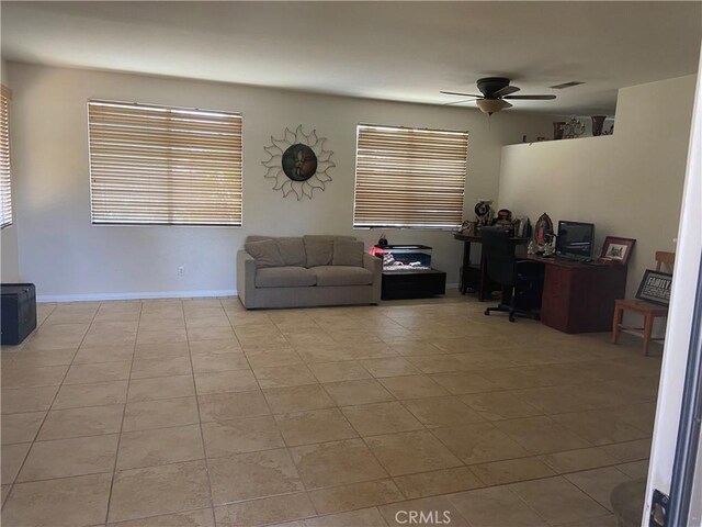 30710 Tierra Linda Ct, Menifee, CA 92584 - tiled living area featuring a ceiling fan and a desk