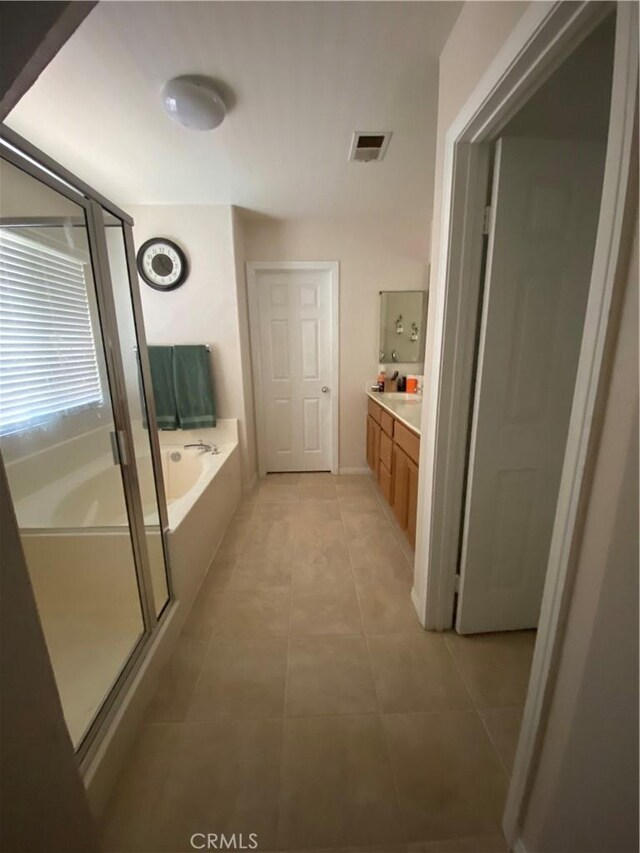 30710 Tierra Linda Ct, Menifee, CA 92584 - full bath featuring a bath, vanity, tile patterned flooring, and a stall shower