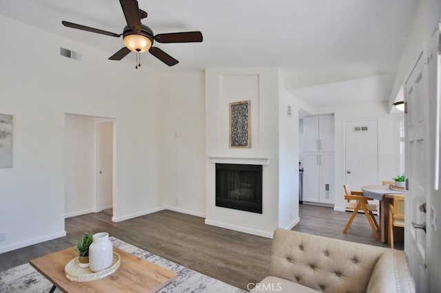 45 Via Hermosa, Rancho Santa Margarita, CA 92688 - living area with wood finished floors, a ceiling fan, and a fireplace