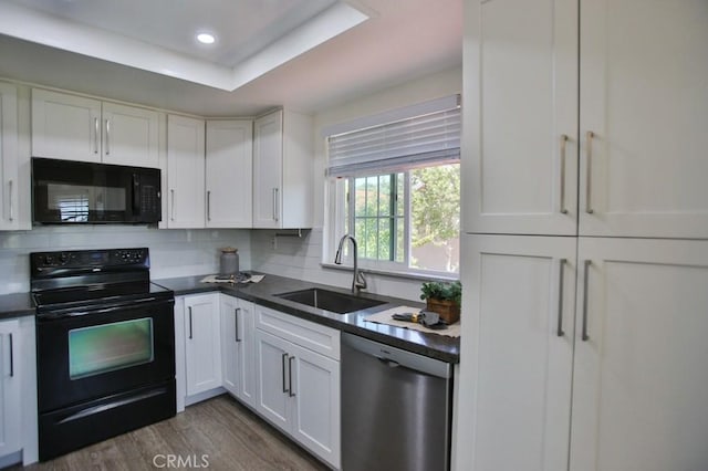 45 Via Hermosa, Rancho Santa Margarita, CA 92688 - kitchen featuring black appliances, a sink, white cabinetry, dark countertops, and recessed lighting